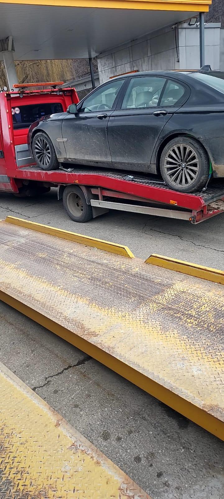 Transport BMW pe platformă CTI AutoLine stație taxare A7