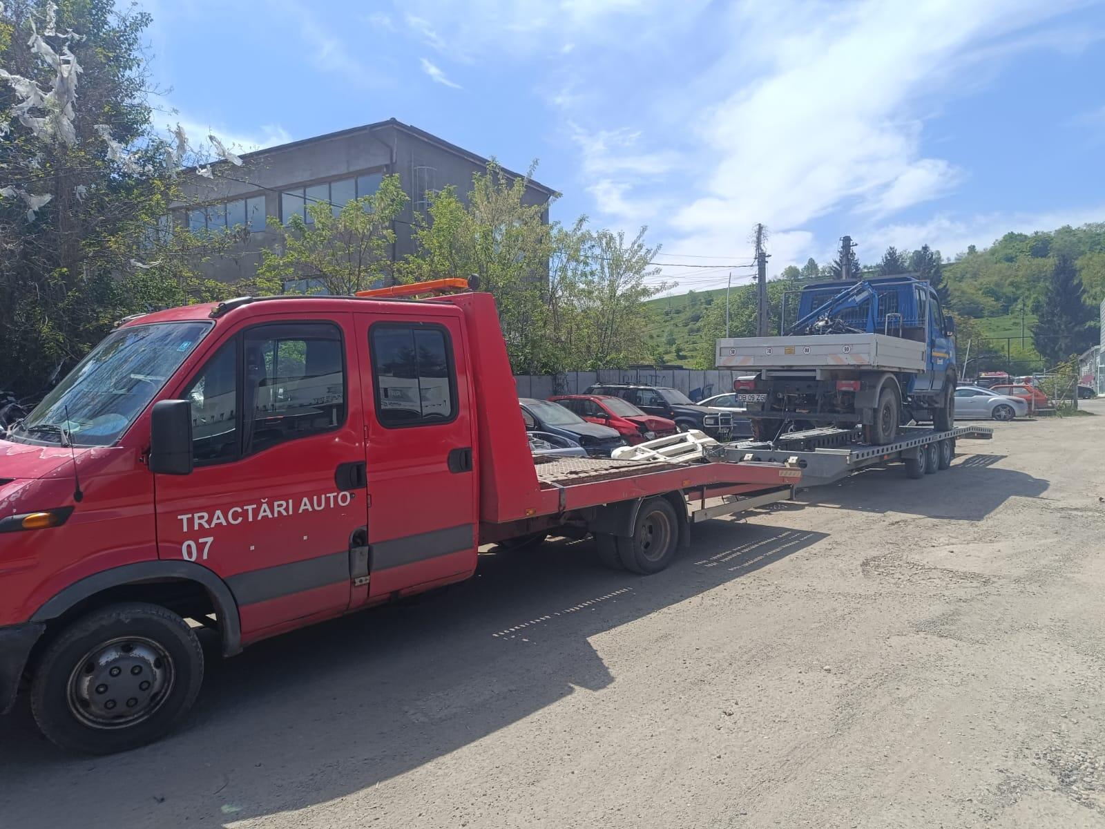 Transport camion utilaj pe platformă extinsă CTI AutoLine